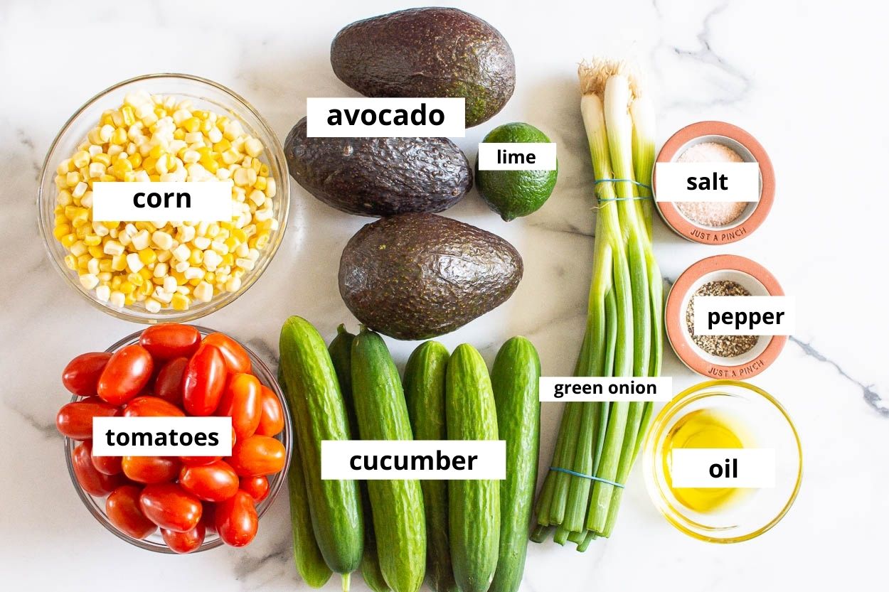 Avocado, corn, tomatoes, cucumber, lime, oil, salt, pepper and green onion.