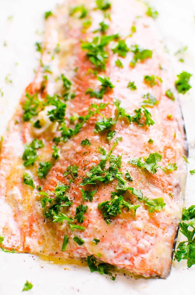Baked salmon recipe with garlic butter and parsley.