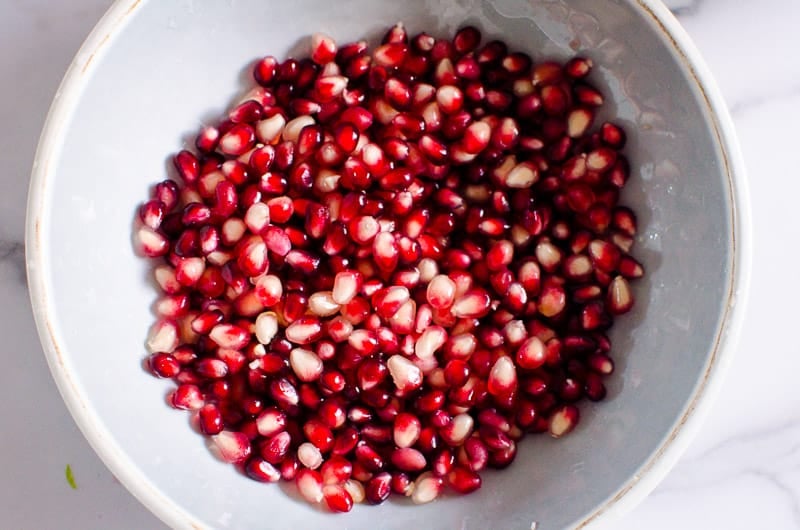 Pomegranate arils in bowl.