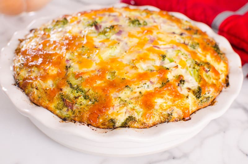 Baked crustless broccoli quiche on the kitchen counter.