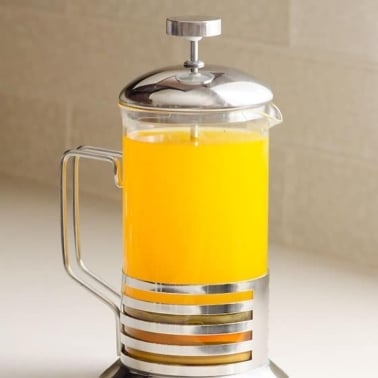 Anti inflammatory tea in a glass French press.