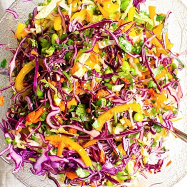 Healthy Asian chopped salad in a glass bowl.