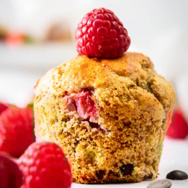 banana protein muffins with a berry on top