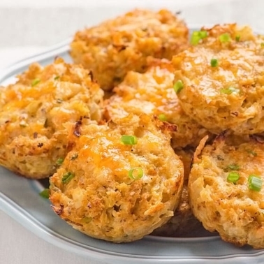 Cauliflower biscuits served on a plate.
