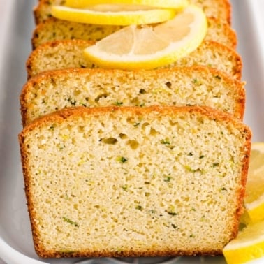healthy lemon zucchini bread with lemon slices on top