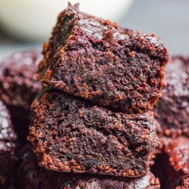 Healthy zucchini brownies stacked.