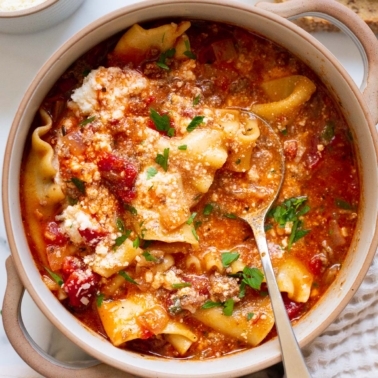 Instant Pot lasagna soup in a bowl with spoon.