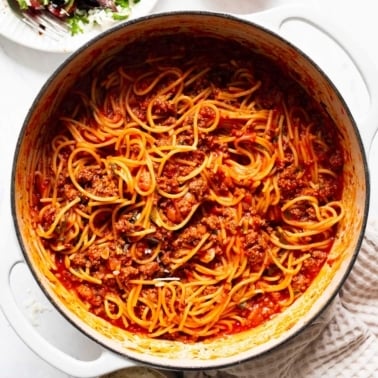 One pot spaghetti in white pot.