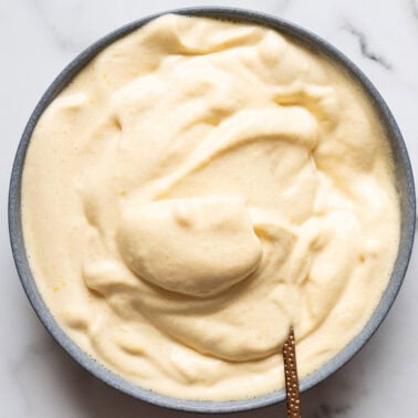 Protein fluff in a bowl with a spoon.