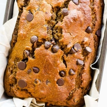 Healthy pumpkin chocolate chip bread in a loaf pan.