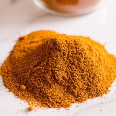 Pumpkin pie spice substitute in a pile on counter.