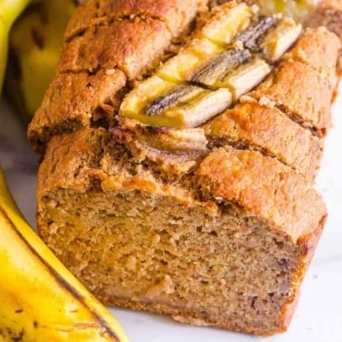 A loaf of healthy banana bread sliced.
