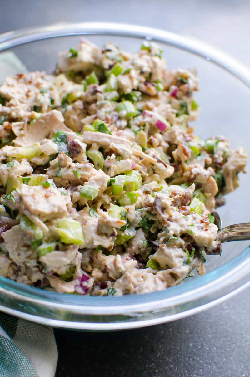 Healthy chicken salad in a glass bowl.