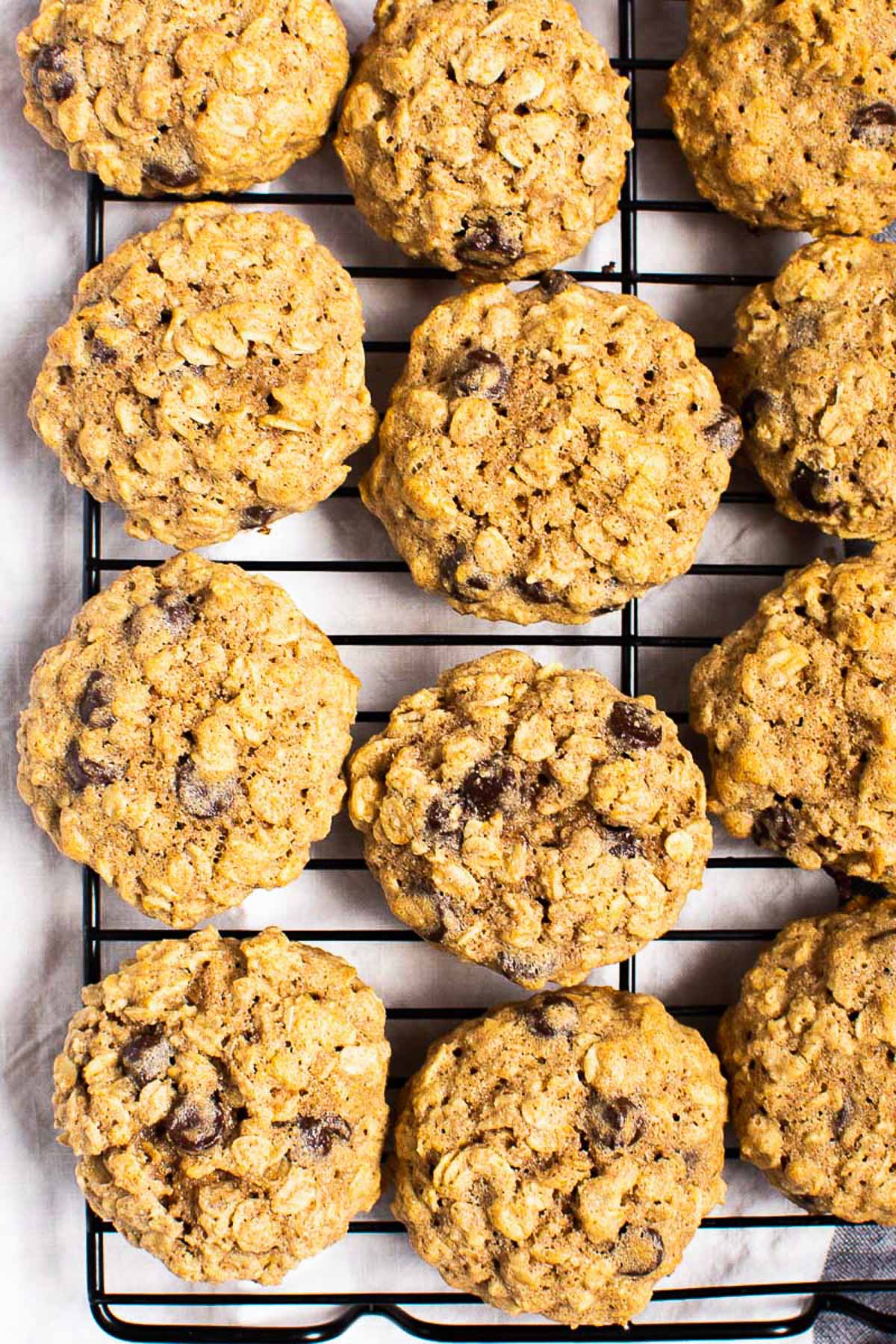 Healthy oatmeal cookies on a cooling rack.