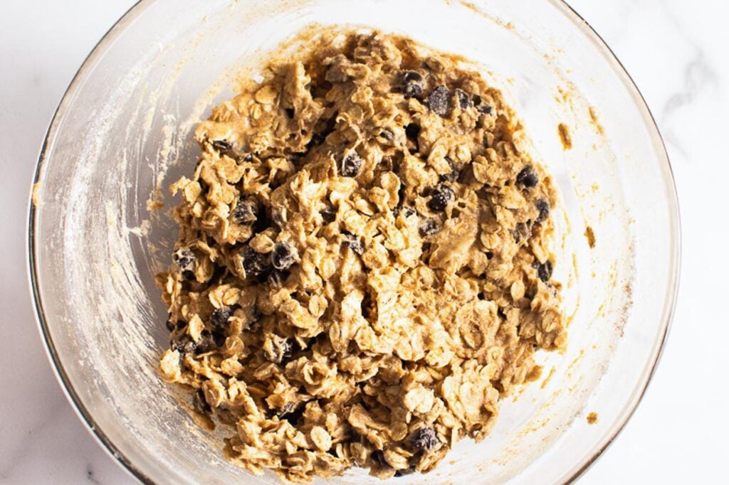 Oatmeal cookie dough in a bowl.