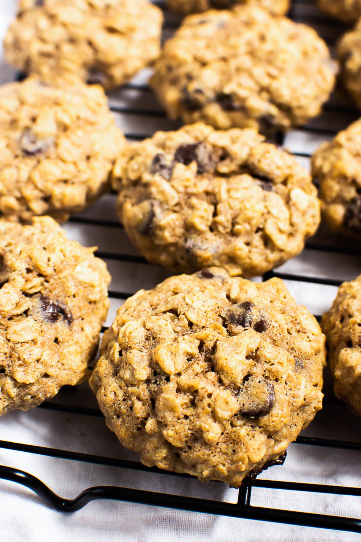 Healthy oatmeal cookies on a cooling rack.