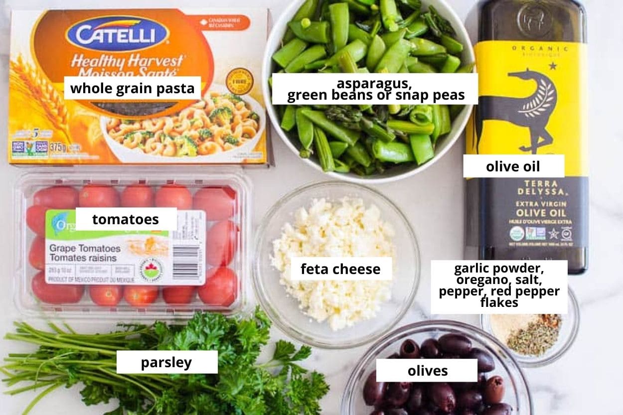 Whole grain pasta, tomatoes, asparagus, snap peas, feta, olive oil, parsley, olives, garlic powder, oregano, red pepper flakes, salt and pepper.