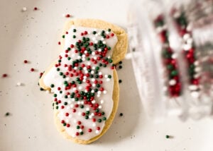 putting sprinkles on sugar cookies