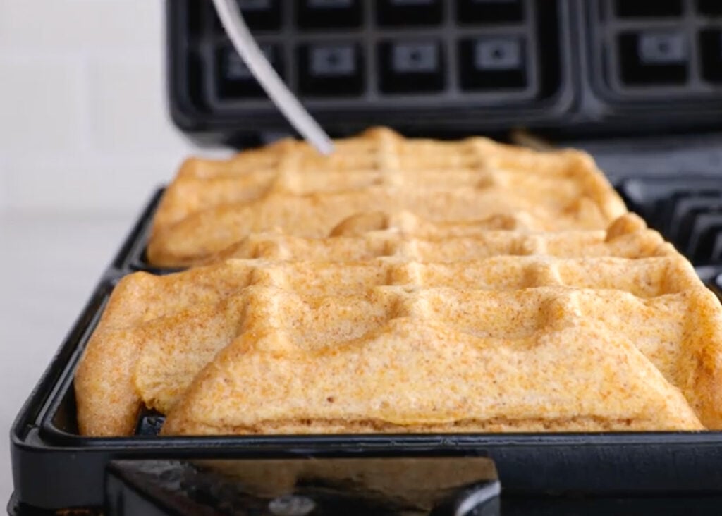 Waffle in a waffle maker.