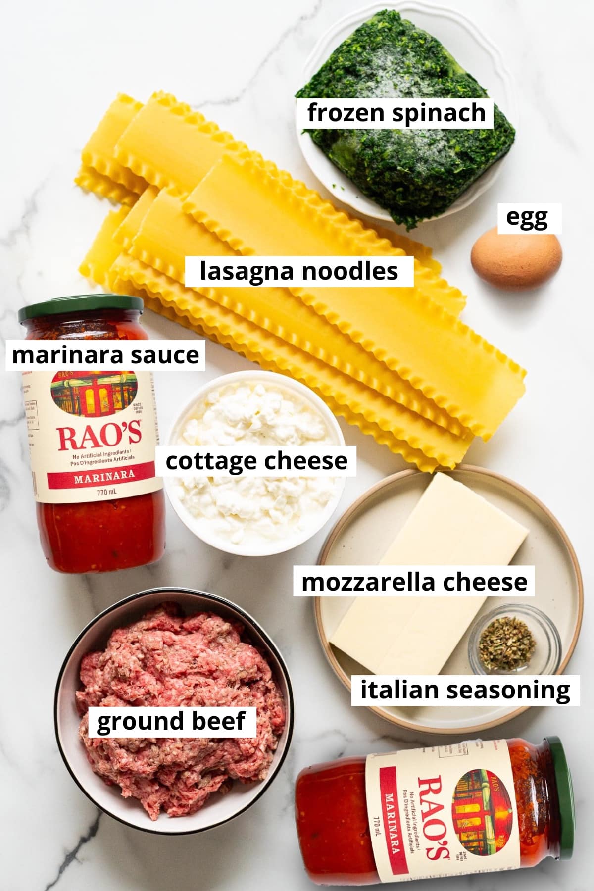 Marinara sauce, ground beef, mozzarella cheese, Italian seasoning, cottage cheese, lasagna noodles, egg, frozen spinach.