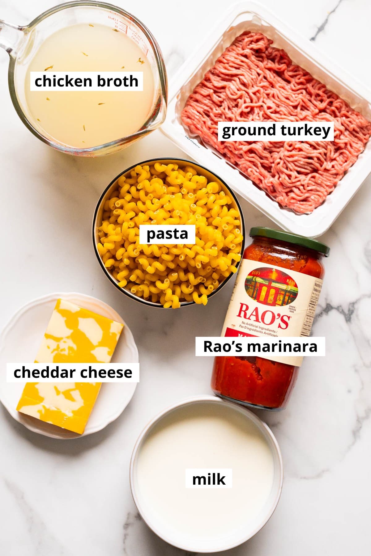 Ground turkey, chicken broth, pasta, marinara sauce, cheddar cheese, milk.