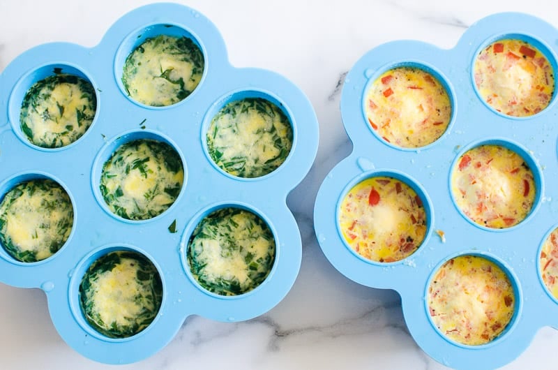 Close up of two molds with cooked egg bites in Instant Pot.