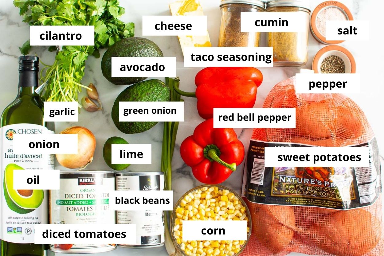 Sweet potatoes, cheese, corn, black beans, red bell pepper, avocado, green onion, lime, onion, diced tomatoes, oil, garlic, cilantro, cheese, cumin, taco seasoning, salt and pepper.