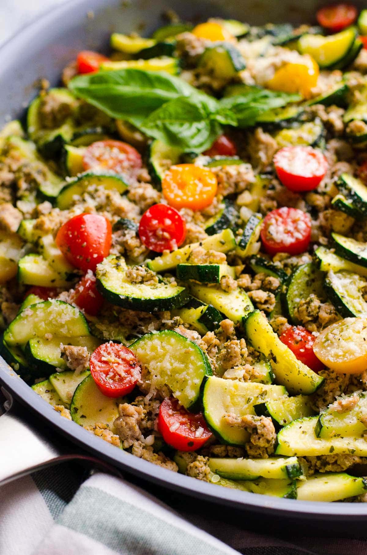 Low carb ground turkey skillet garnished with parmesan cheese.